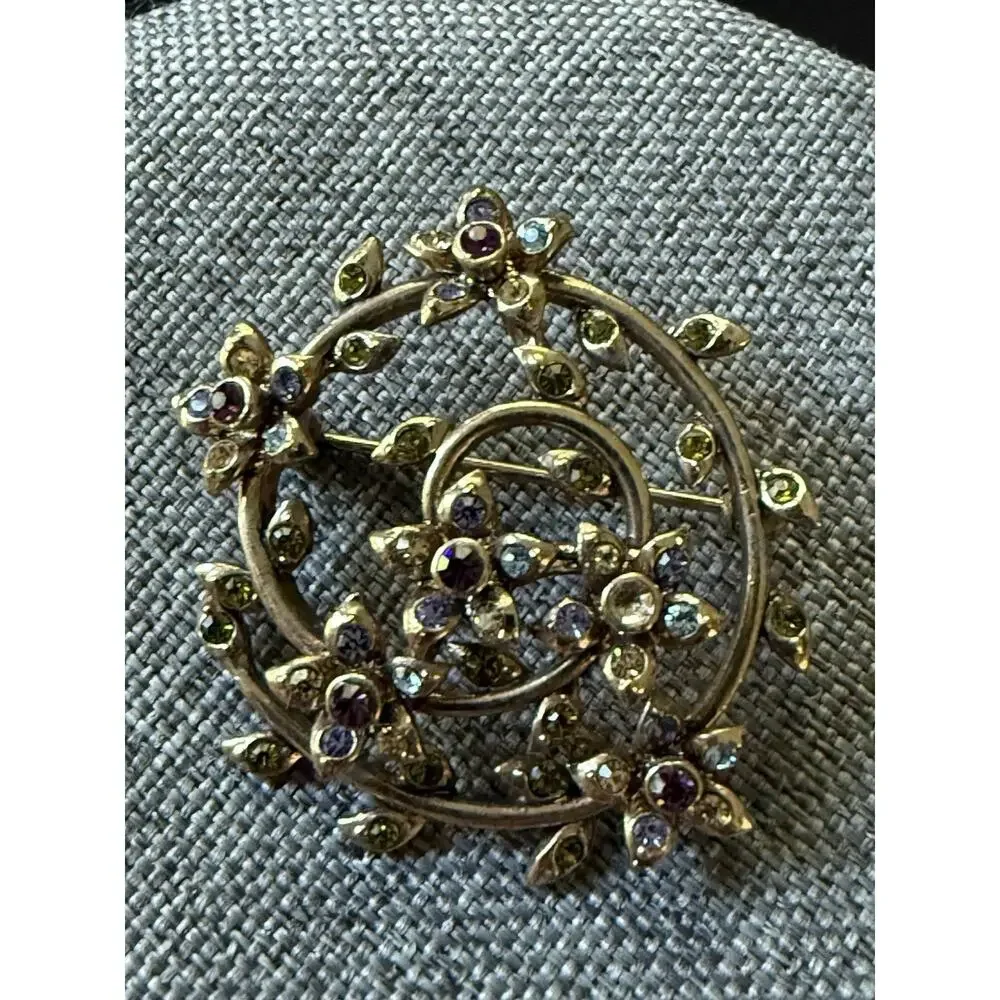 Vintage Signed Monet Gold Tone Multicolored Rhinestone Swirl & Floral Brooch Pin